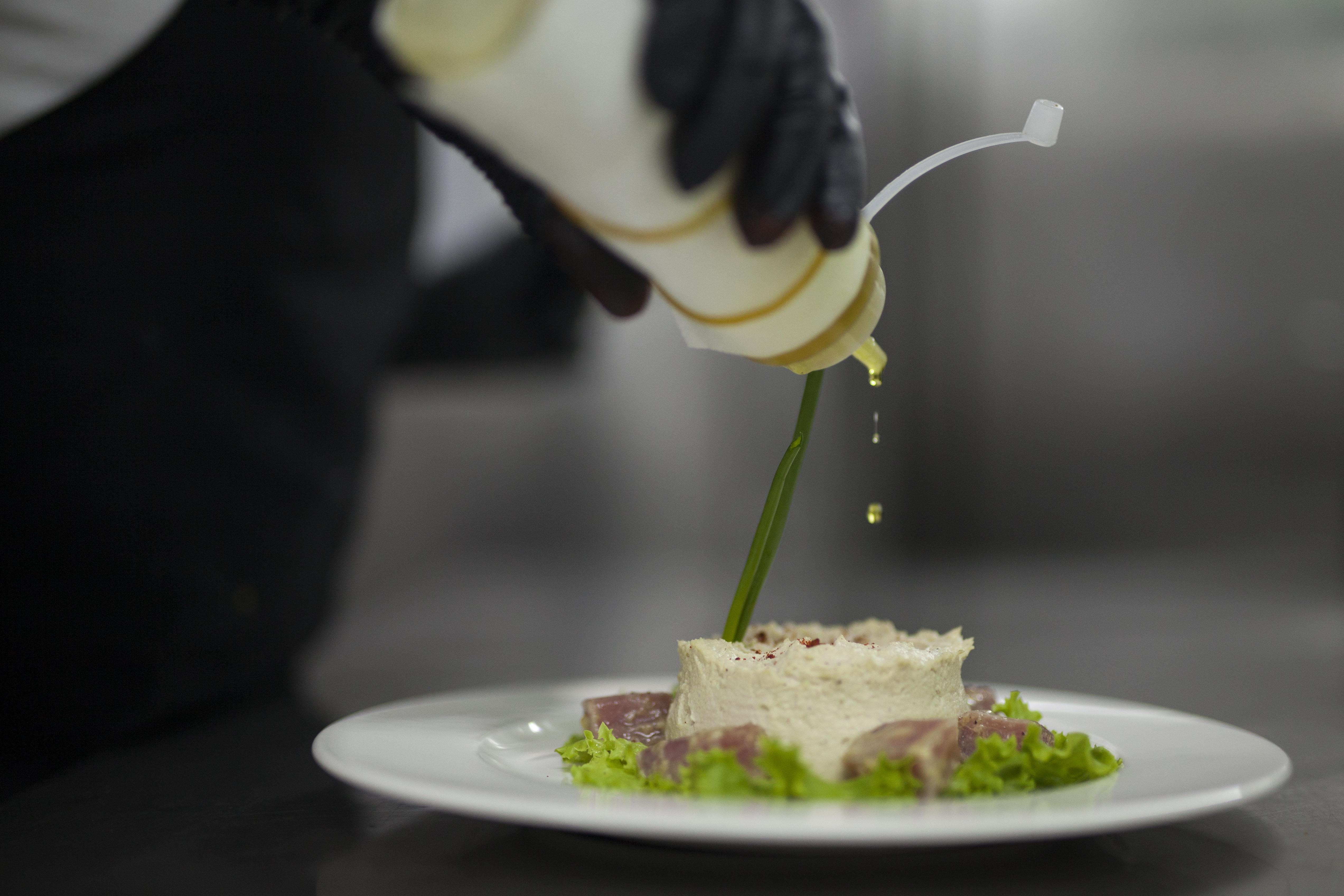 Grand Hotel Yerevan - Small Luxury Hotels Of The World エクステリア 写真 A chef finishing a dish